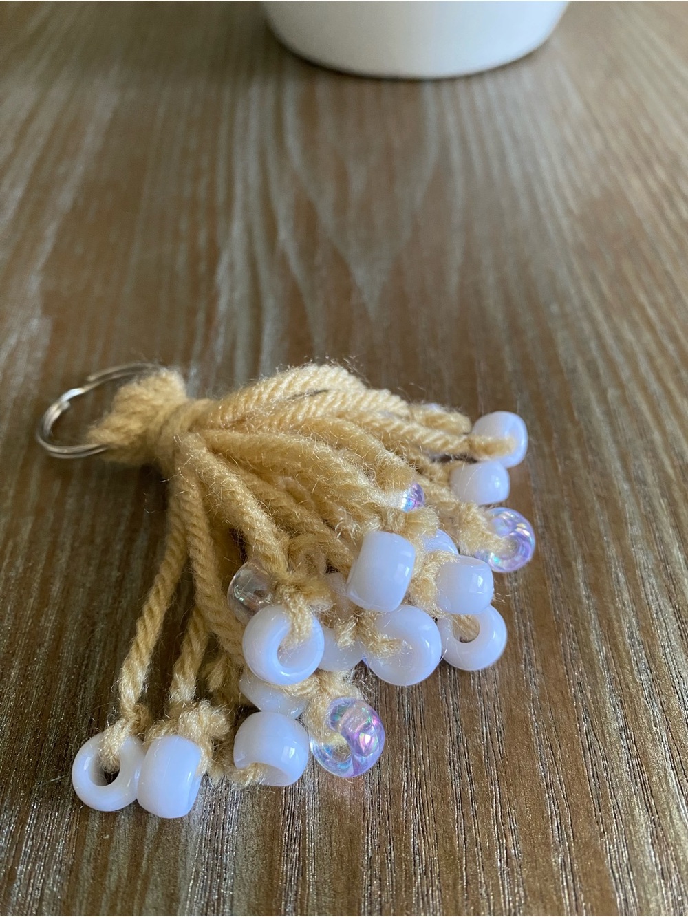 Handmade Beige Tassel Keychain with Shell Accents